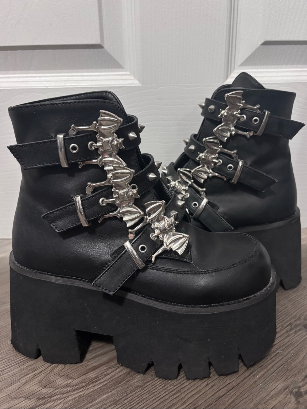 Demonia Ashes-55 Bat Buckle Platform Boots
